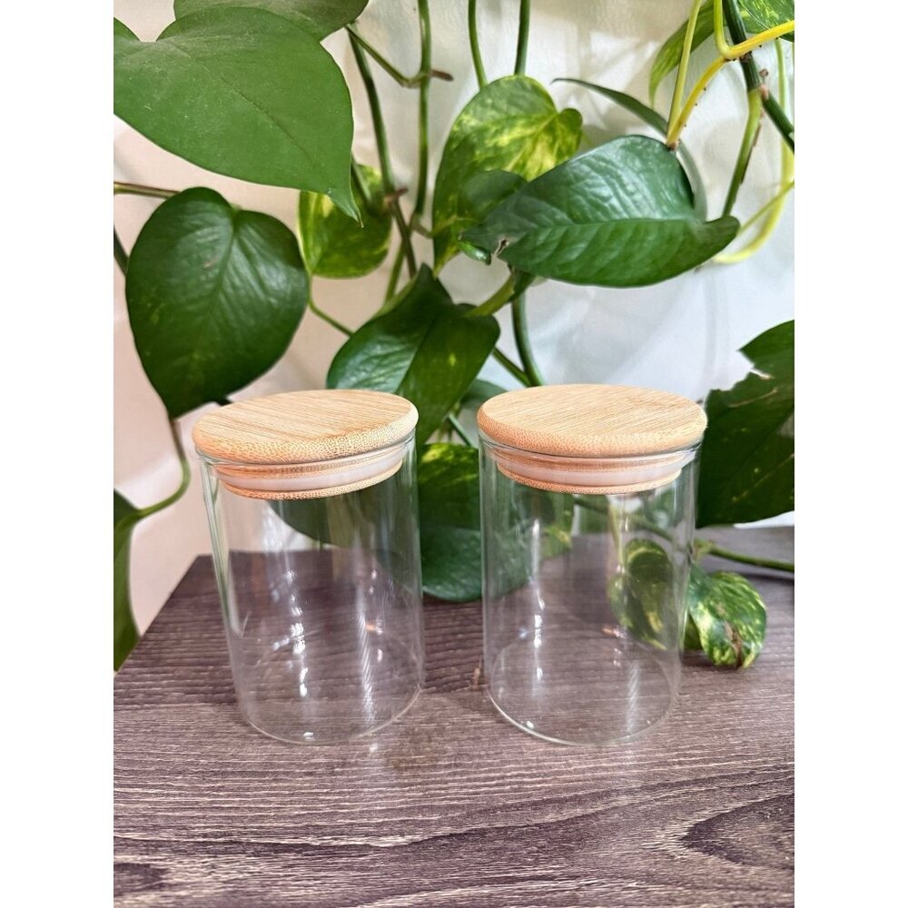 Two wooden sealed jars
